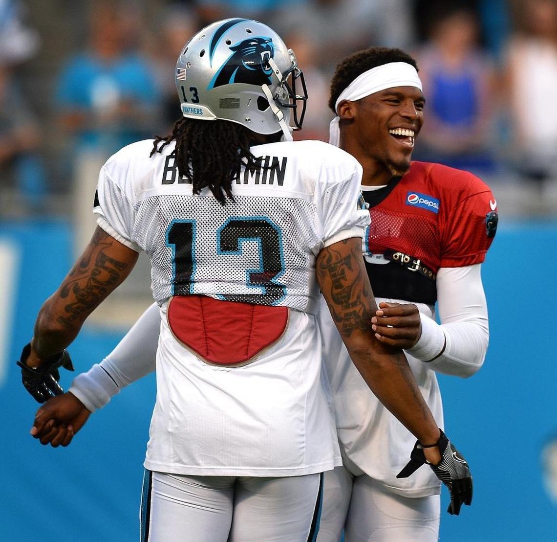In happier times, Kelvin Benjamin (13) and Cam Newton joked around during Fan Fest in August at Bank of America Stadium.
