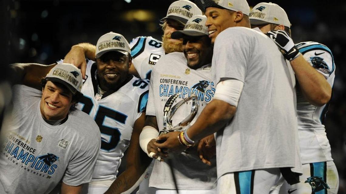 Six members of the all-time top 20 Carolina Panthers posed together after winning the NFC Championship over Arizona in Charlotte on Jan. 24, 2016. From left: Luke Kuechly, Charles Johnson, Greg Olsen, Thomas Davis, Cam Newton and Ryan Kalil (mostly hidden behind Newton).