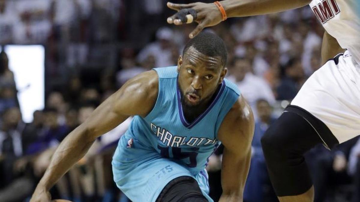 Charlotte Hornets guard Kemba Walker (15) drives against Miami Heat guard Josh Richardson during the first half of Wednesday’s game. The Heat won 115-103.