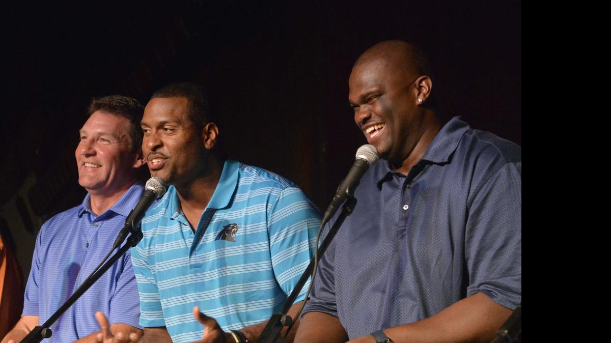 
Former Panther Mike Rucker (center) now will be the color analyst once again in 2015 on Carolina’s four preseason TV broadcasts. Rucker -- flanked in this picture by former Panthers Wesley Walls on the left and Travelle Wharton on the right -- believes the Panthers will go 9-7 and make the playoffs this season.
