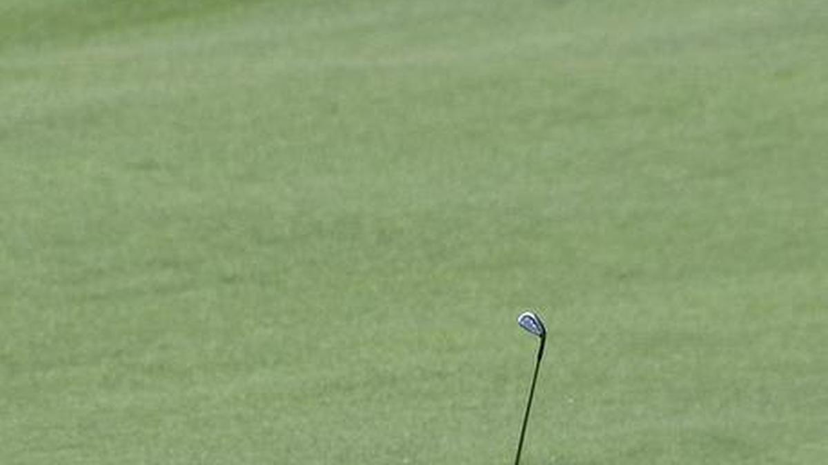 Jordan Spieth hits onto the second green Saturday on his way to a round of 68. He is in position for a top-three finish despite an opening round Thursday that included a 9 on his scorecard.