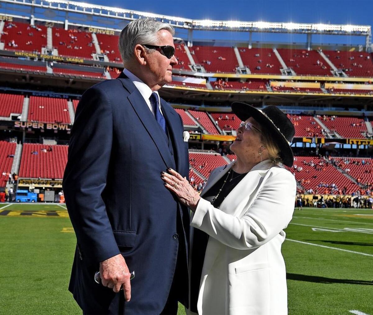Carolina Panthers owner Jerry Richardson and his wife, Rosalind Richardson, walked along the sidelines in Santa Clara, Calif., before the Super Bowl on Feb. 7, 2016.