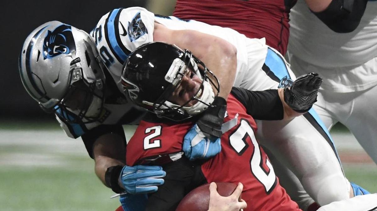 Carolina Panthers middle linebacker Luke Kuechly (59) sacked Atlanta Falcons quarterback Matt Ryan in 2017. The Panthers who are 6-17 in team history at Atlanta, square off against the Falcons Sunday.