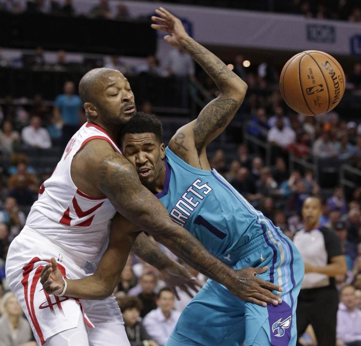 Charlotte Hornets rookie Malik Monk (right) had an on-and-off night Friday vs. Houston, scoring 10 points on nine shots.
