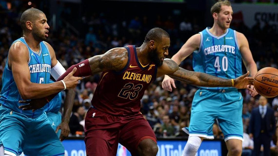 Nic Batum (left) scored 16 points in his season debut Wednesday night against LeBron James and the Cleveland Cavaliers, who beat the Charlotte Hornets 115-107. All but one of Batum’s points came in the first half; he admitted later he got tired in the final quarter.