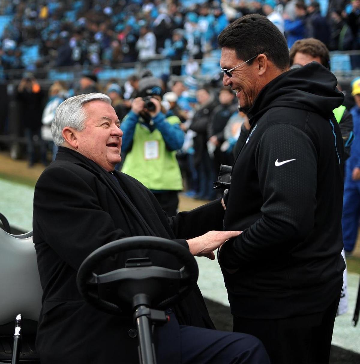 Carolina Panthers team owner Jerry Richardson, left, talked with head coach Ron Rivera in early 2016. Rivera said Sunday of the NFL investigation into allegations of Richardson’s workplace misconduct: “You are guessing at this point. We will just let the process unfold.”