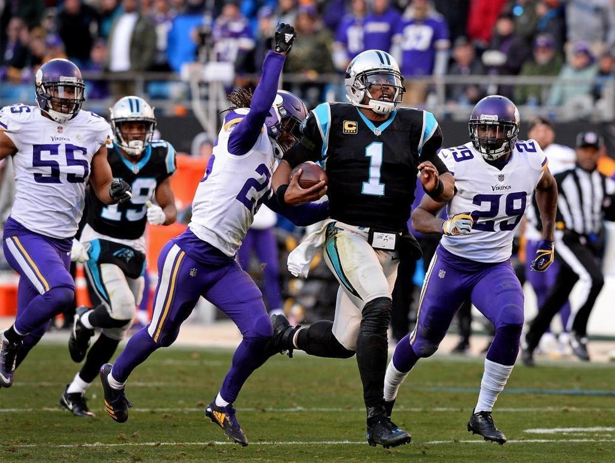 Carolina quarterback Cam Newton (1) breaks off a 62-yard run in the fourth quarter against Minnesota Dec. 10th. The run set up the game-winning touchdown in the Panthers’ 31-24 win.