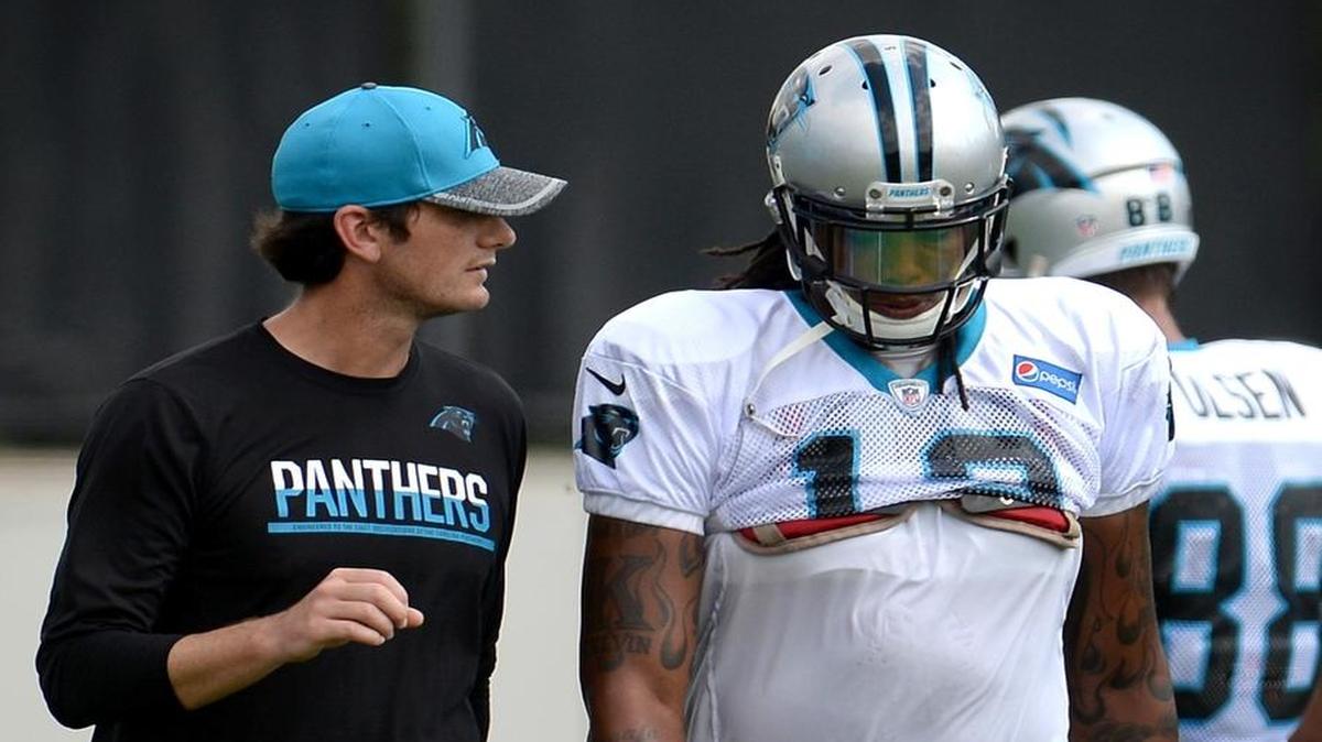 Kelvin Benjamin (right) in 2016 while listening to Carolina Panthers quarterbacks coach Ken Dorsey during a practice.