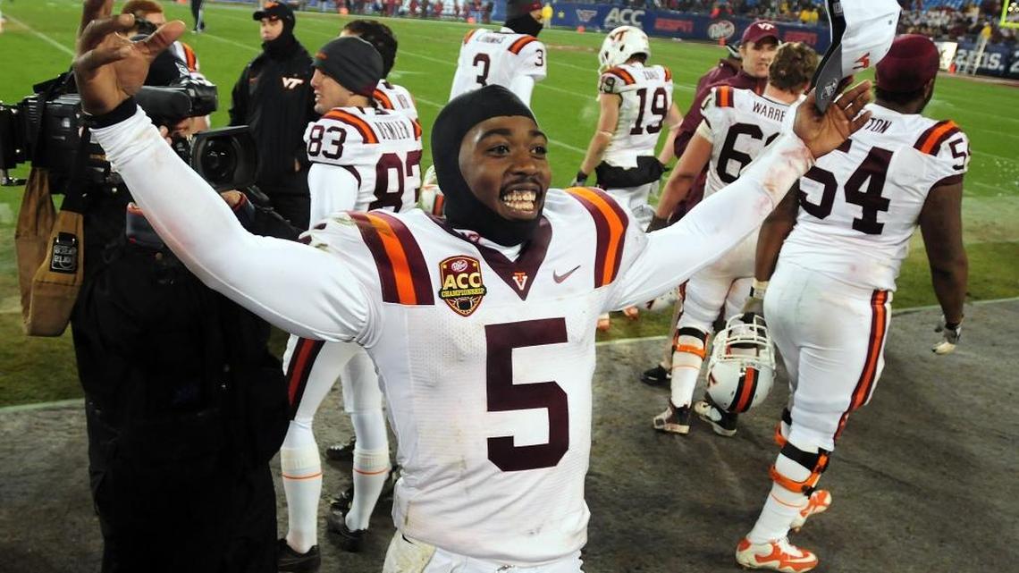 
Virginia Tech quarterback Tyrod Taylor celebrates after the Hokies beat Florida State, 44-33, for the 2010 ACC championship. 
