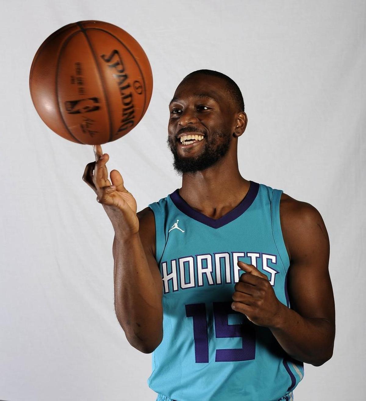 Charlotte Hornets Kemba Walker poses for a portrait during the team's media day in 2017.