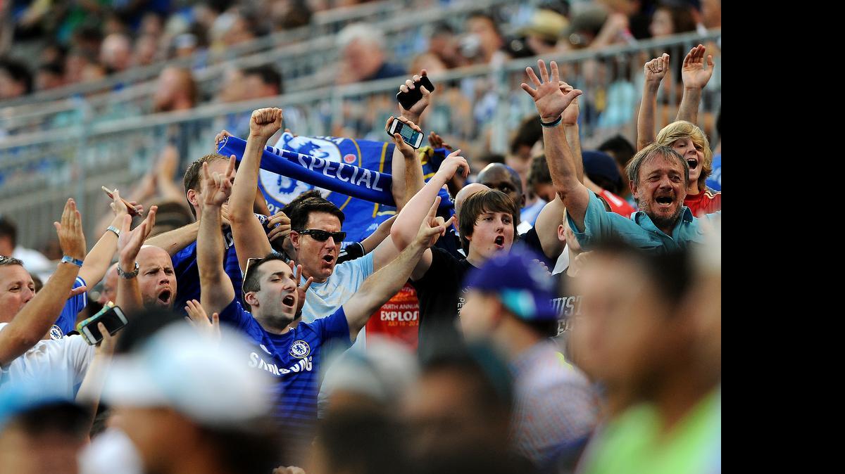 
Fans celebrate the sudden death between Paris Saint-Germain and Chelsea during the International Champions Cup soccer match vs at Bank of America Stadium in Charlotte on Saturday, July 25, 2015. Chelsea defeated Paris Saint-Germain on penalty kicks.

