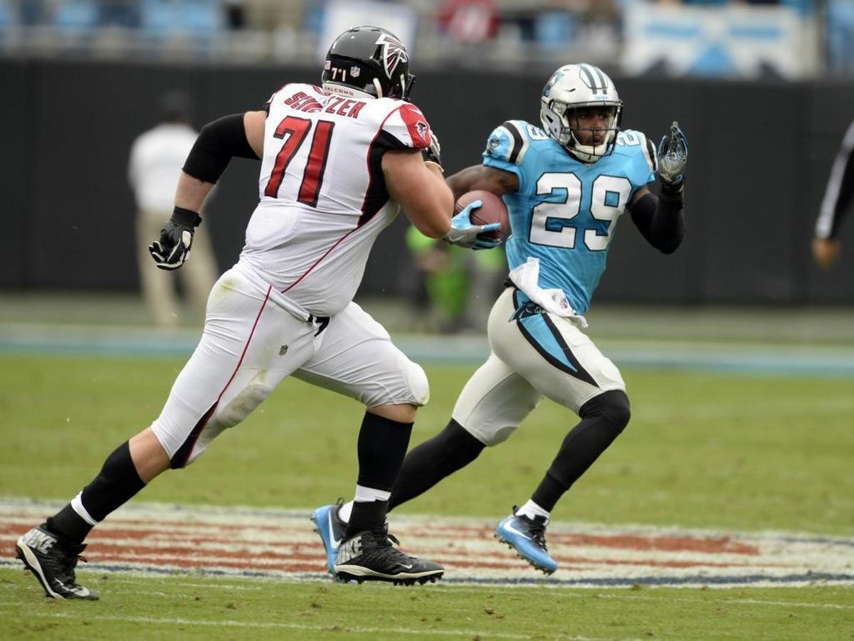 Carolina Panthers strong safety Mike Adams (29) runs back an interception late in the second quarter Sunday. Adams’ 40-yard return set up the go-ahead touchdown for Carolina, which won the game, 20-17.