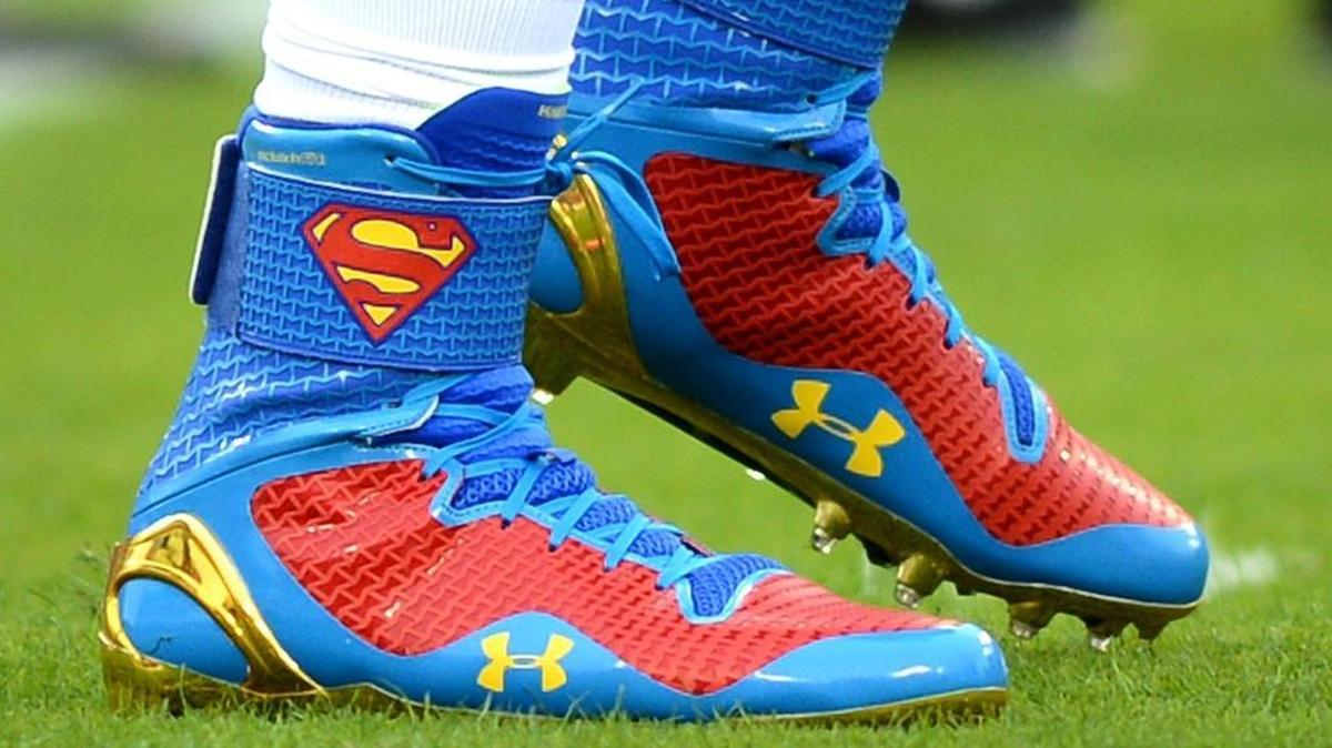 Panthers quarterback Cam Newton wore these “Superman” cleats in pregame warmups in Tampa, Fla., in 2013. New Charlotte Hornets center Dwight Howard has his own pair of basketball shoes with a Superman logo that he has worn in an actual game before.