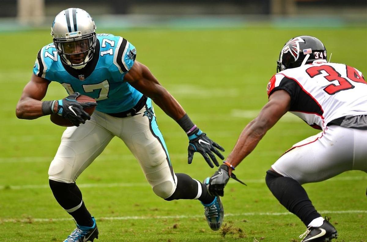 Carolina Panthers wide receiver Devin Funchess, left, looks for extra yardage in Carolina’s 20-17 win over Atlanta in November. The Panthers (8-4) and Falcons (7-5) are both competing for an NFC playoff spot but trailing New Orleans (9-3) in the NFC South standings.