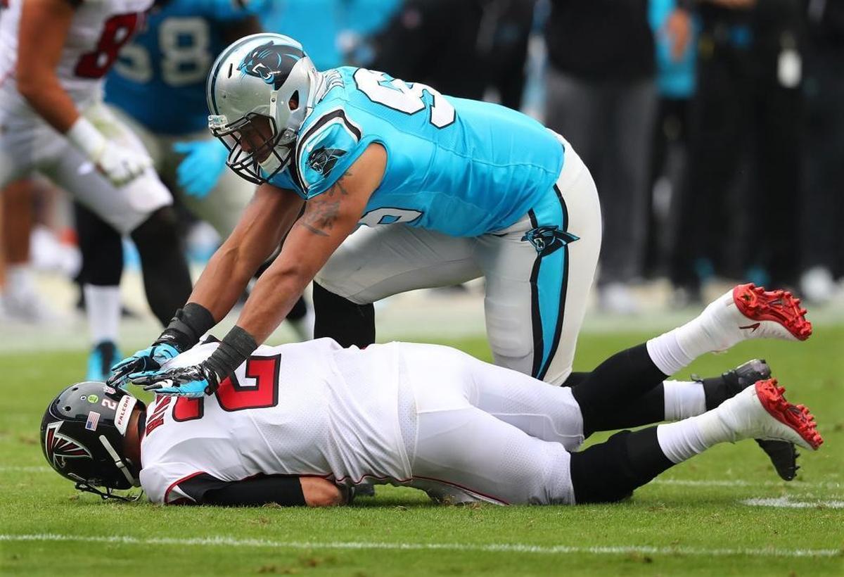 Carolina defensive end Wes Horton sacks Atlanta quarterback Matt Ryan Sunday during the Panthers’ 20-17 win.