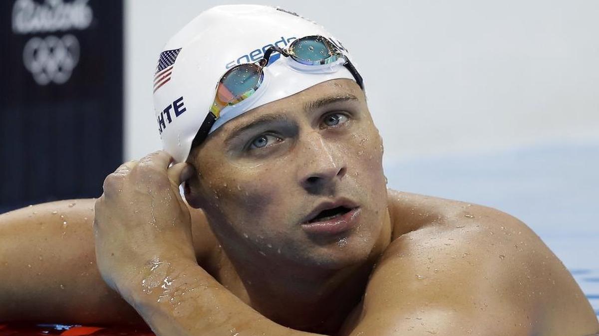 Ryan Lochte’s story about being robbed in Rio has become a shiny distraction from the Olympics and dragged three other swimmers into the muck, but what’s the truth?