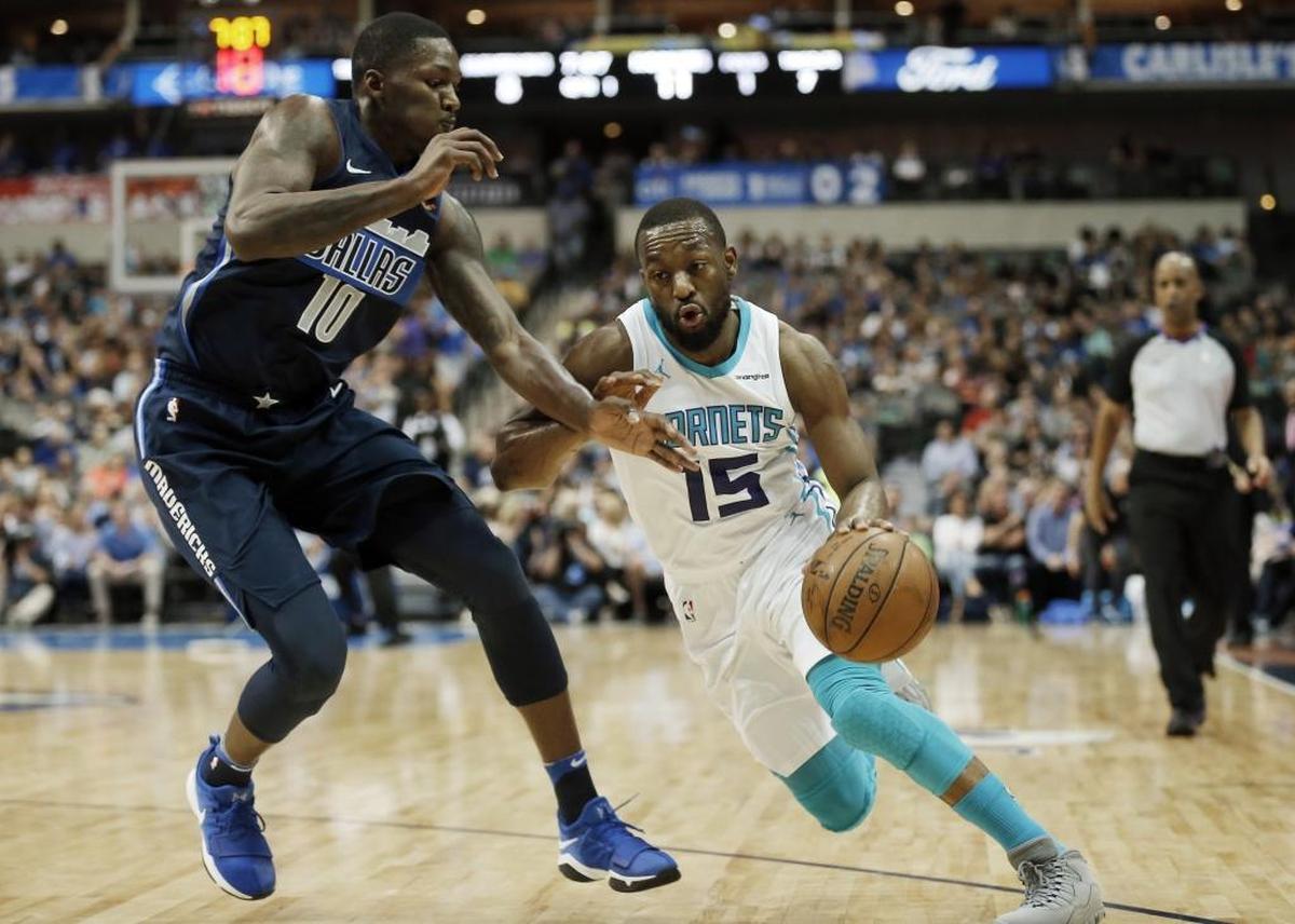 Charlotte Hornets guard Kemba Walker (15) drives against Dallas Saturday. Walker has been a standout for most of his seven NBA seasons, but he has yet to win a playoff series in his career and has only been to the postseason twice.