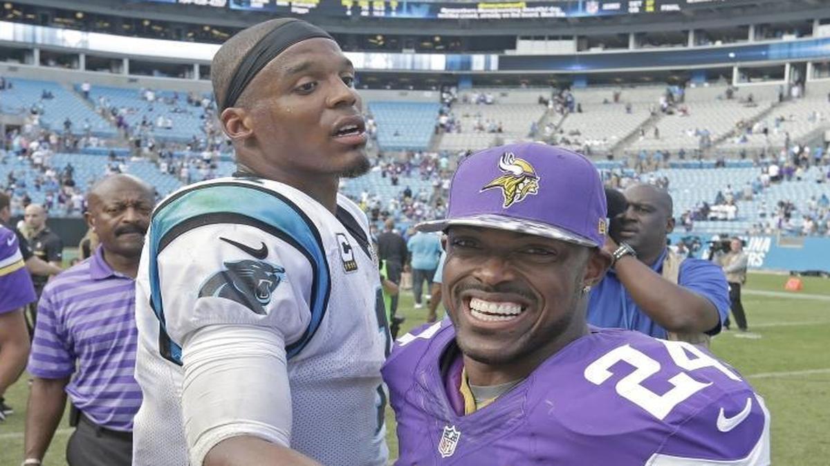 Cam Newton (1) greeted Minnesota cornerback Captain Munnerlyn after a game in 2016. Munnerlyn played for the Panthers for five years and will become a free agent once again in March.