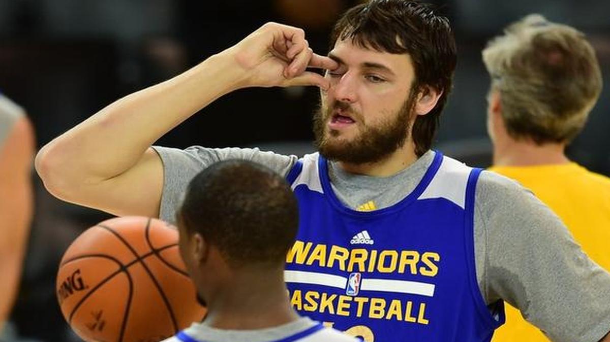
Golden State center Andrew Bogut (R) is such an unselfish offensive player that he borders on passivity. Bogut gave up an open dunk in Game 1 to throw the ball outside for a three-pointer.
