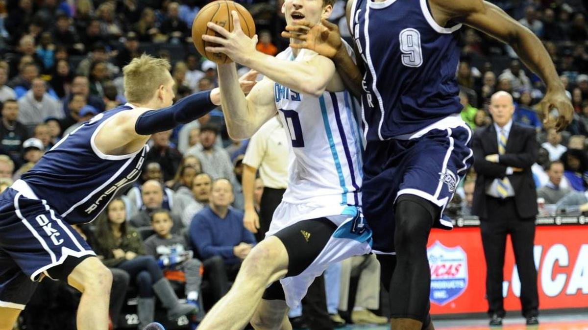 
The Charlotte Hornets’ Cody Zeller (with ball) has long been most comfortable inside, but a new emphasis on the “four-out” offense by the Hornets will mean he has to also be able to make the corner three-point shot this season. 
