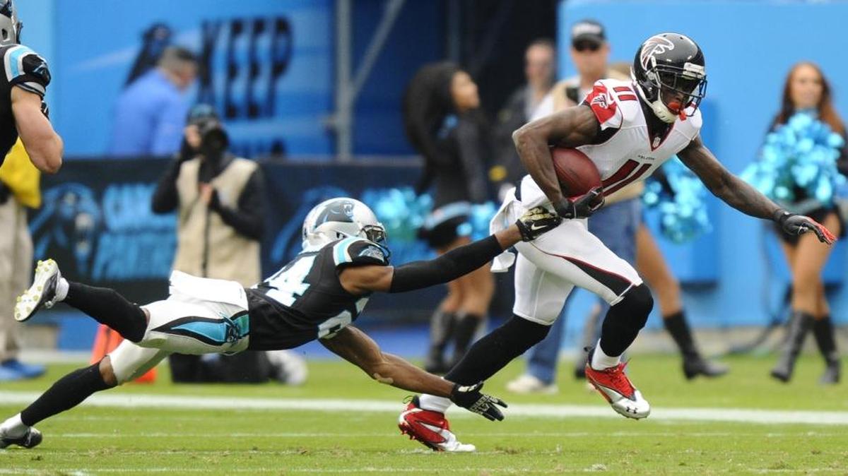 
Panthers cornerback Josh Norman (24) stretches out for Atlanta’s Julio Jones (11) in a 2014 game. The two will face off twice in a three-week span this December in a couple of games that should go a long way toward determining Norman’s true market value, as well as Carolina’s playoff chances. 
