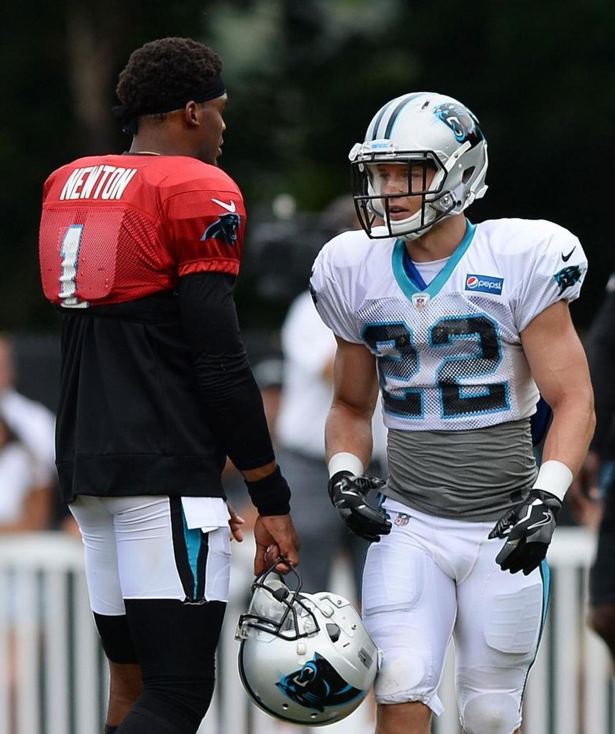 Carolina Panthers quarterback Cam Newton, left, and running back Christian McCaffrey will be an integral part of the 2017 Carolina offense. Only McCaffrey will play in the opening exhibition against Houston Wednesday night, however.