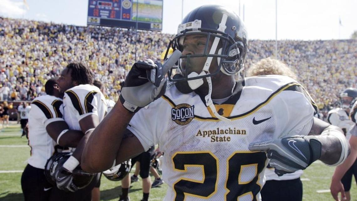 Appalachian State running back Kevin Richardson tells the crowd of 109,218 at the “Big House” in Michigan to quiet down after the Mountaineers’ 34-32 win over the No. 5 Wolverines on Sept. 1, 2007.