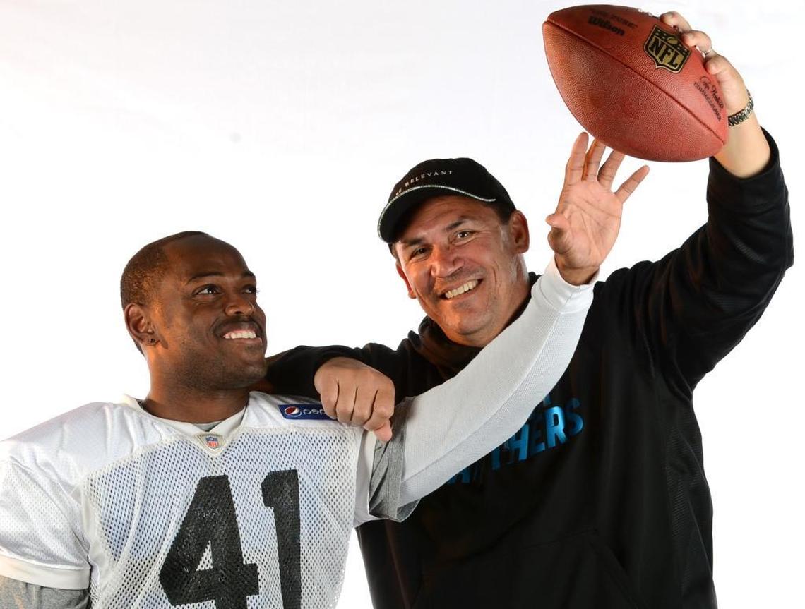 Panthers coach Ron Rivera has always enjoyed a good relationship with Captain Munnerlyn. Rivera teased the cornerback in this 2013 file photo by holding a ball just out of his reach.