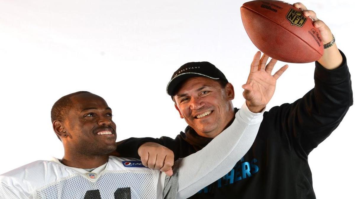 Panthers coach Ron Rivera has always enjoyed a good relationship with Captain Munnerlyn. Rivera teased the cornerback in this 2013 file photo by holding a ball just out of his reach.
