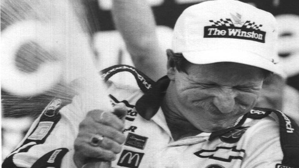 
Dale Earnhardt celebrates in Victory Lane after winning The Winston, as NASCAR’s all-star race was called at the time, at Charlotte Motor Speedway in 1990.
