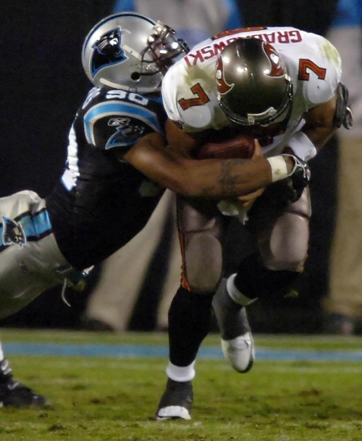 According to Jon Gruden, in his 11 NFL seasons the defensive player who sacked his quarterbacks the most times was Julius Peppers. Here was one of those sacks, in a 2006 Carolina-Tampa Bay game.