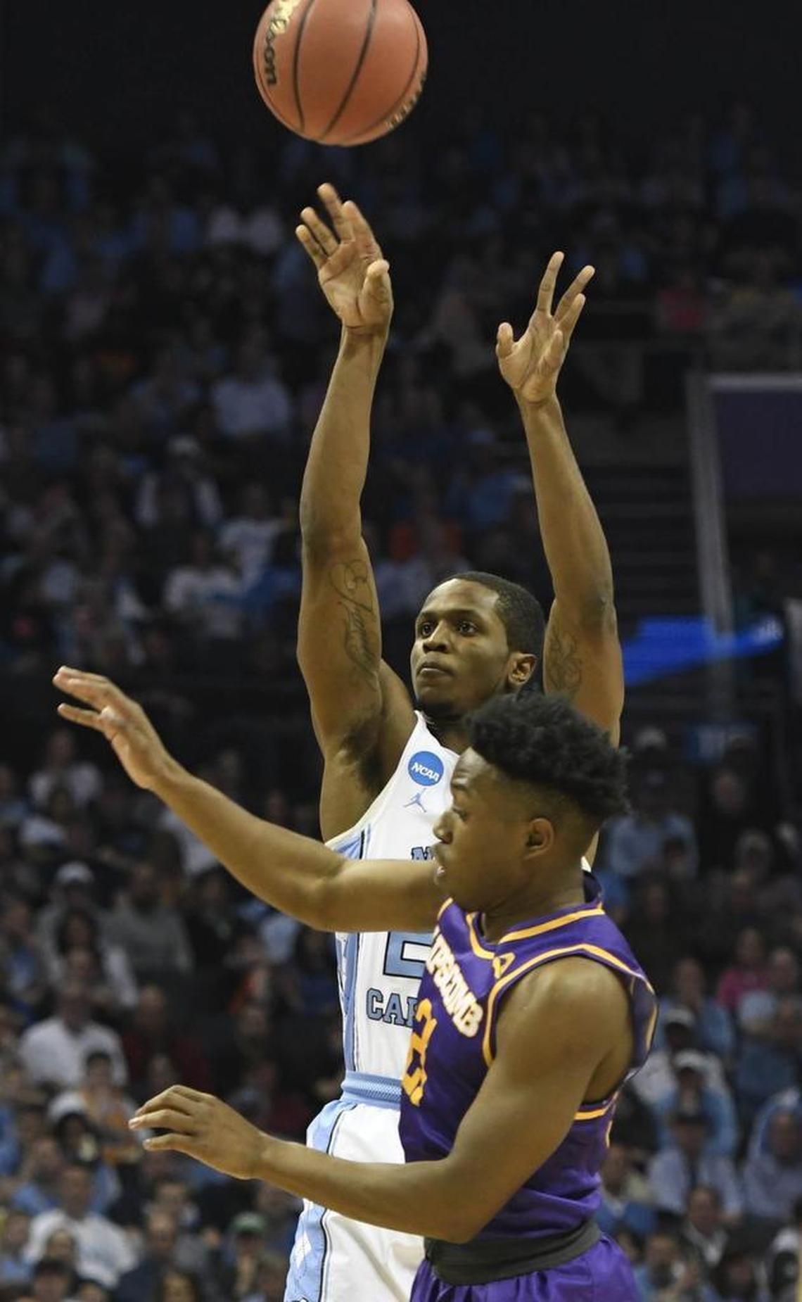 North Carolina Tar Heels guard Kenny Williams (24) shoots over Lipscomb Bisons guard Kenny Cooper (21). Williams made four of his five attempts from three-point range and scored a team-high 18 points on only eight shots.