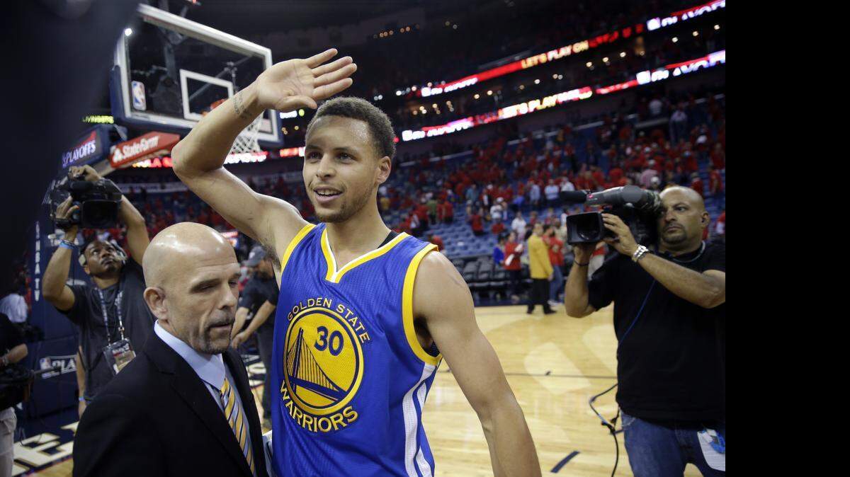 
Golden State Warriors guard Stephen Curry (30) reacts after their overtime victory in Game 3 of a first-round NBA basketball playoff series against the New Orleans Pelicans in New Orleans, Thursday, April 23, 2015. The Warriors won in overtime 123-119, to take a 3-0 lead in the best-of-seven series.
