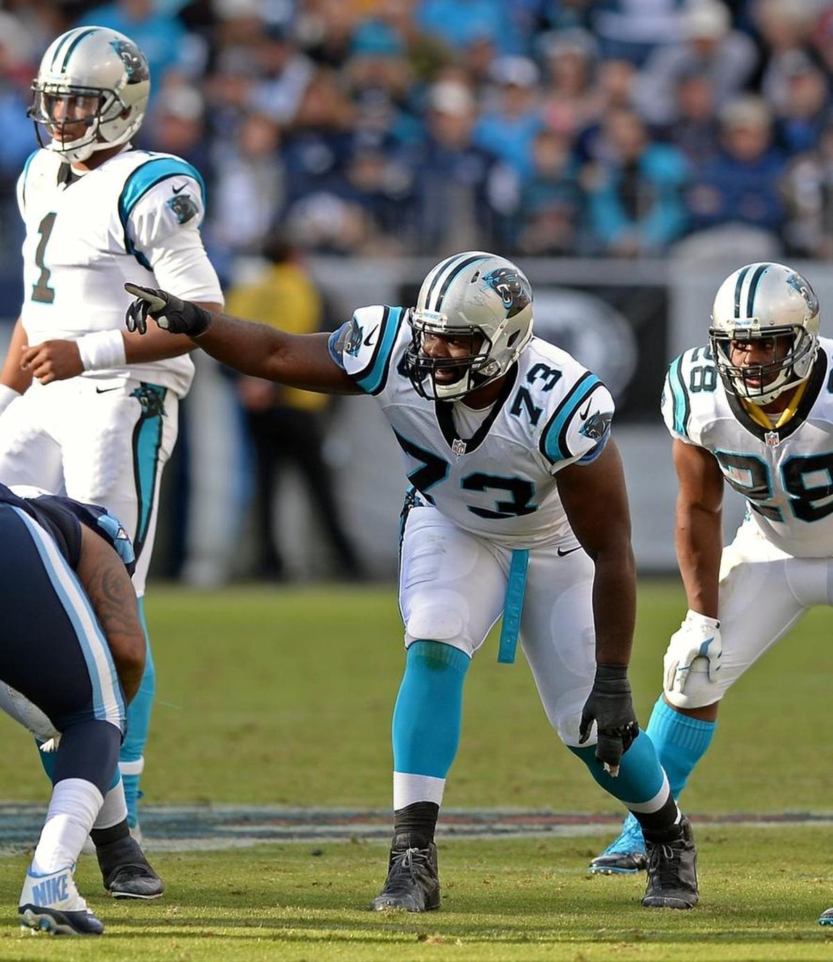 At left tackle, Oher (73) was responsible for protecting the blind side of quarterback Cam Newton (1) during the Panthers’ Super Bowl season of 2015.