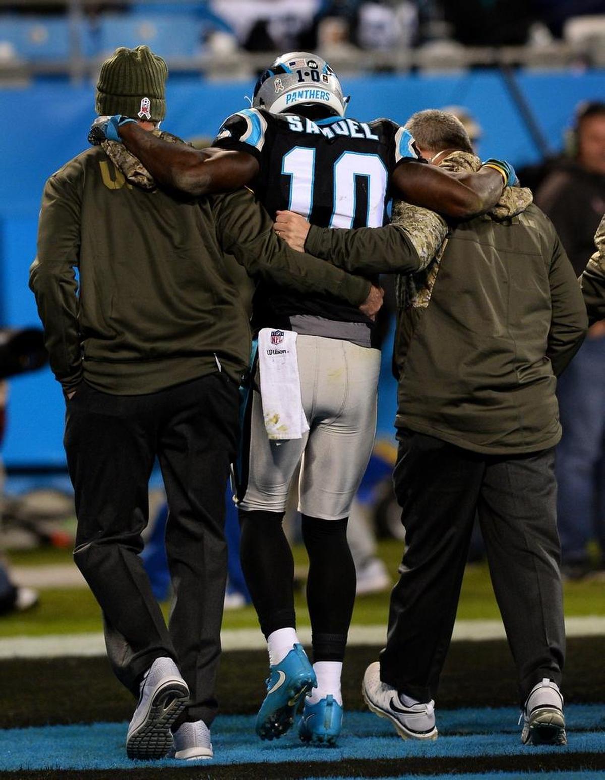 Carolina Panthers wide receiver Curtis Samuel is helped off the field after hurting his ankle -- just after he dropped a potential touchdown pass -- in Carolina’s 45-21 win over Miami Monday night.