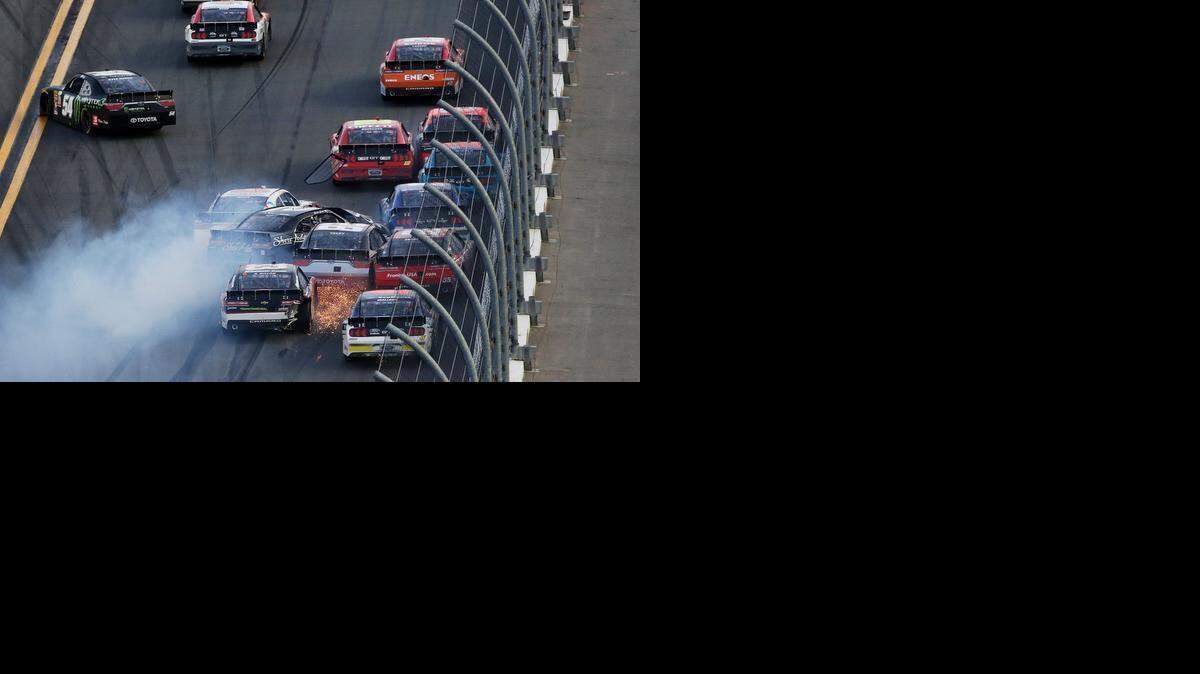 
Kyle Busch, driver of the No. 54 Monster energy Toyota, and others are involved in a large on-track incident during the NASCAR XFINITY Series Alert Today Florida 300 at Daytona International Speedway on Saturday, Feb. 21, 2015 in Daytona Beach, Fla.
