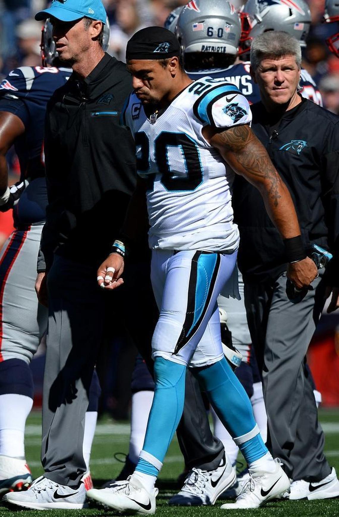 Carolina Panthers safety Kurt Coleman is helped off the field after hurting his knee Oct. 1. Coleman is expected to play again in early November after sustaining an MCL injury.