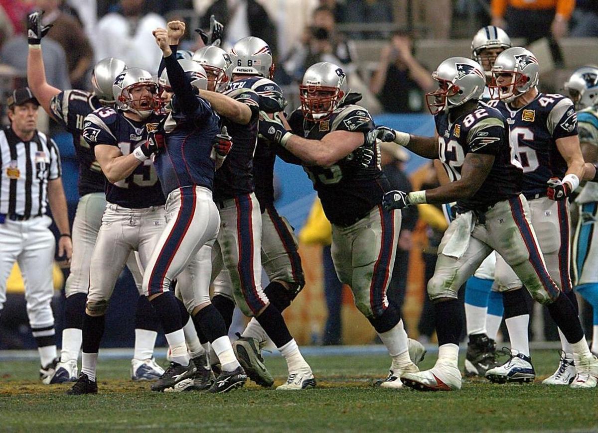 New England players celebrated edging Carolina, 32-29, at the 38th Super Bowl in Houston on Feb. 1, 2004.