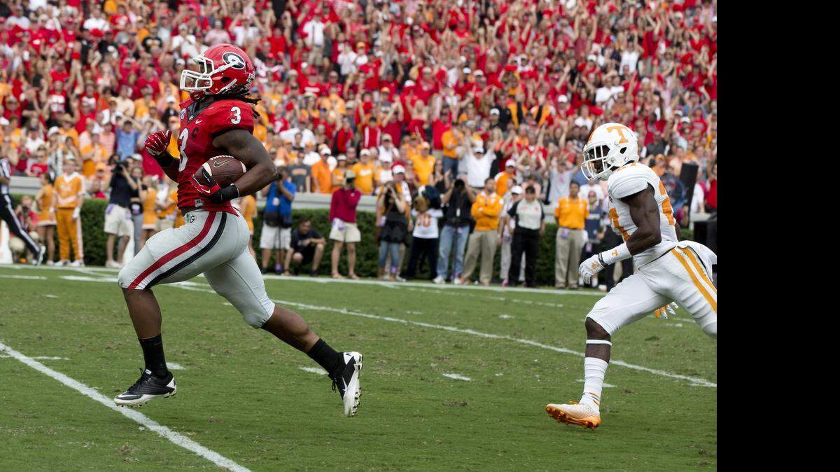 
If Todd Gurley is available for the Panthers at No. 25 in the 2015 NFL draft, they should take him. Otherwise, it’s time for an offensive tackle, says columnist Scott Fowler. 


