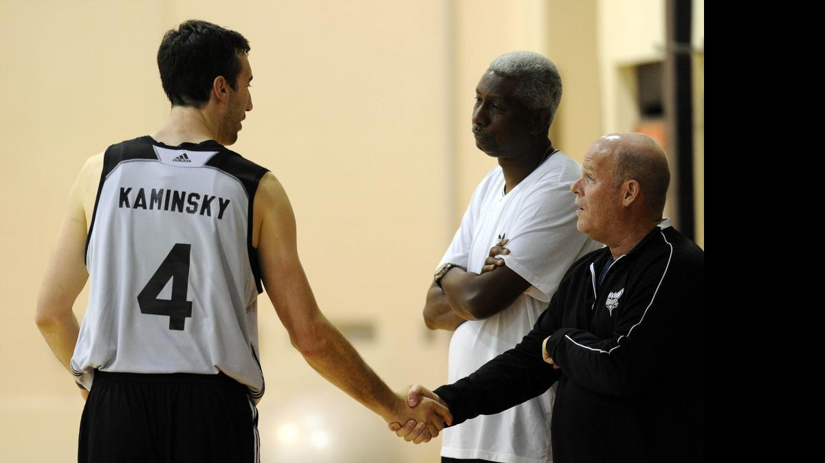 
Charlotte Hornets 2015 first-round draft pick Frank Kaminsky shakes hands with head coach Steve Clifford after practice at the Novant Health Training Center inside Time Warner Cable Arena during Hornets' minicamp for their upcoming summer-league team. 
