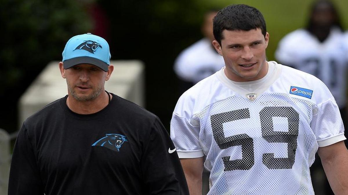 
Middle linebacker Luke Kuechly (right) walks to practice Thursday. Kuechly has led the NFL in tackles in two of his three seasons and will likely command a huge contract extension much like Cam Newton’s before long. 
