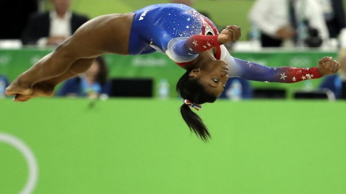Simone Biles bounced her way to gold again Tuesday, winning the floor exercise during the artistic gymnastics women’s apparatus finals at the 2016 Summer Olympics in Rio de Janeiro, Brazil.