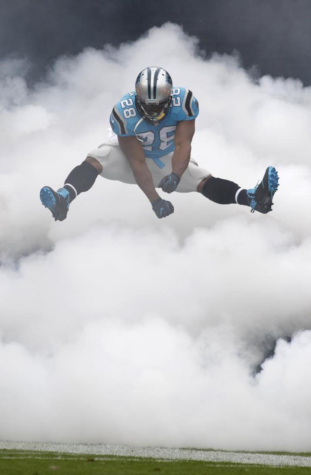 Jonathan Stewart (28) still has some hops, as you can see from his foggy introduction Sunday against Atlanta.