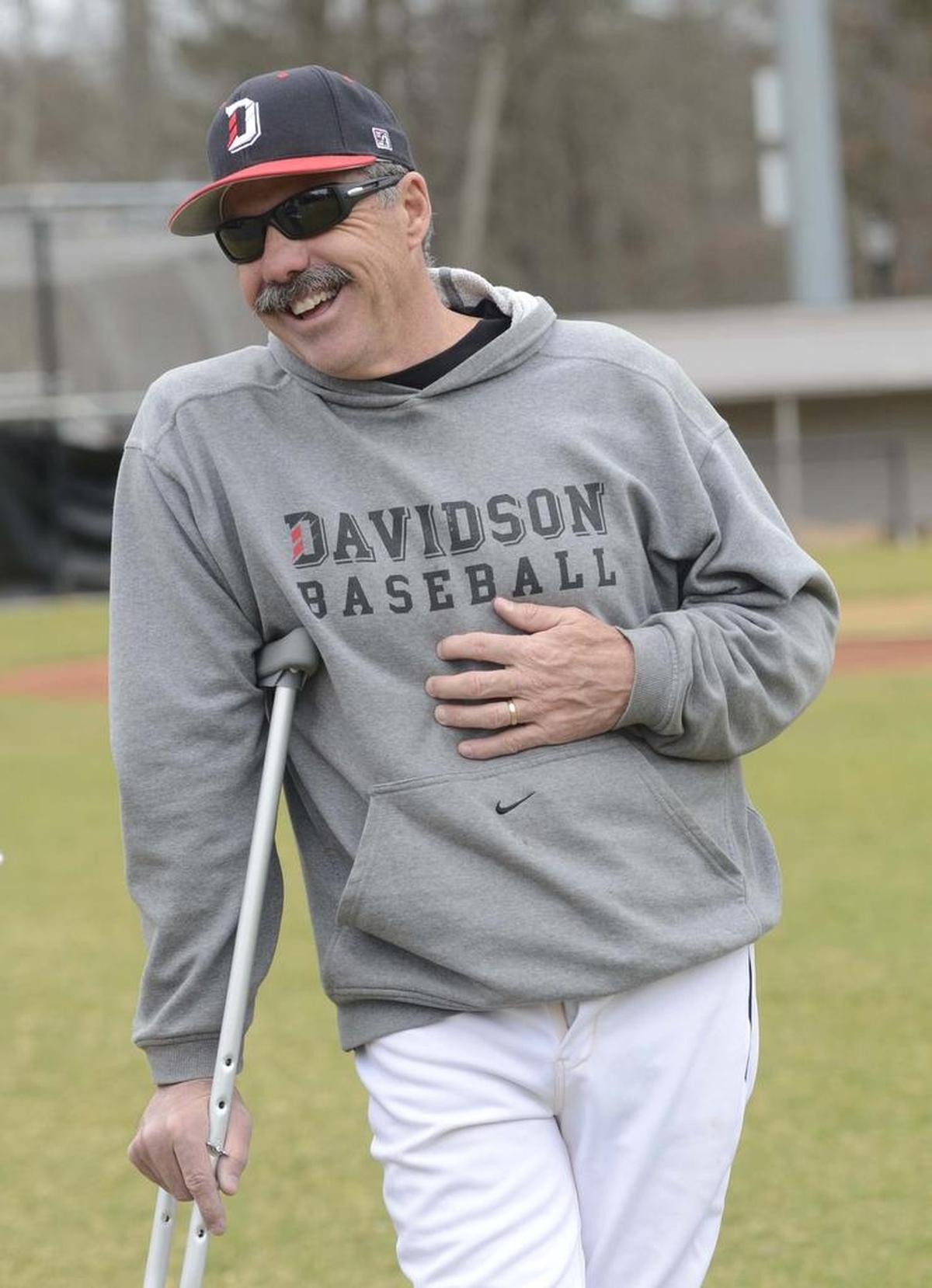 Davidson head baseball coach Dick Cooke had to use a crutch during the 2013 season after nearly dying in an auto accident in which he was rear-ended in 2012.