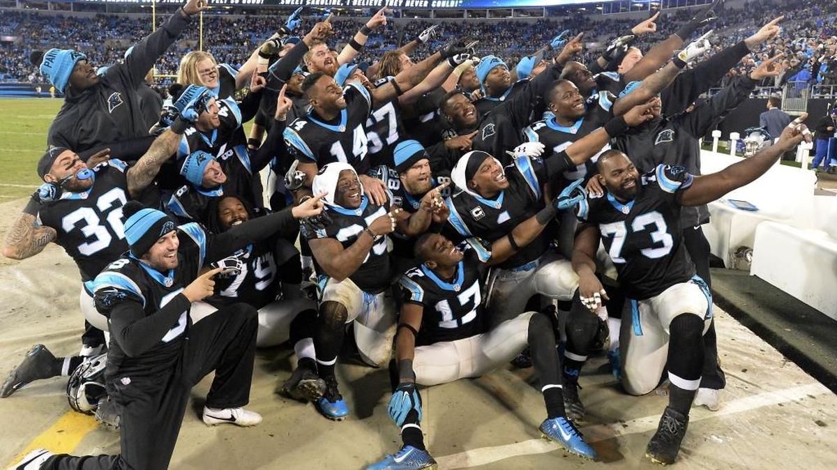 Panthers players pose for an impromptu photo late in the fourth quarter Sunday in Carolina’s 38-10 win over Tampa Bay in Charlotte.