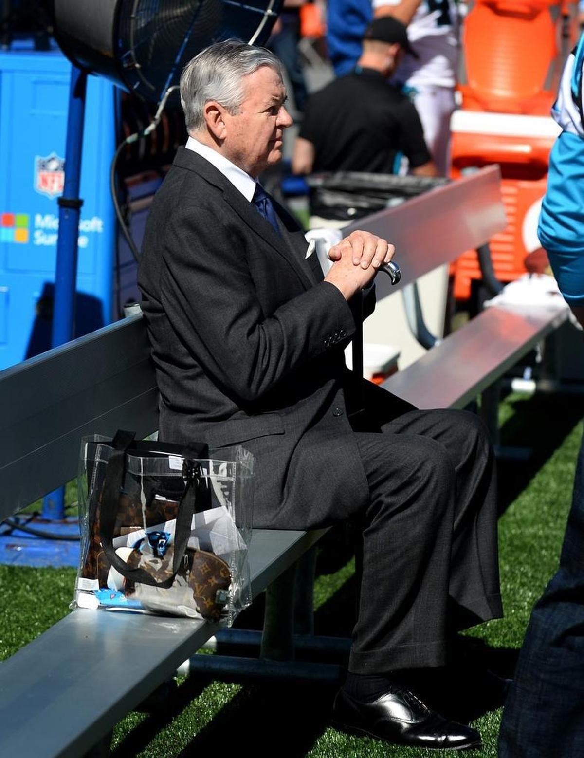 Carolina Panthers owner Jerry Richardson sits along the team's sideline at Gillette Stadium in Foxborough, Mass., in October. Richardson is selling the team – a decision he announced hours after an explosive report by Sports Illustrated about Richardson’s alleged workplace misconduct.