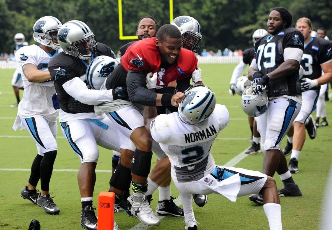 In 2015, Cam Newton (in red jersey) and Josh Norman (24) had a physical confrontation at training camp. The fight came after Norman intercepted one of Newton’s passes.