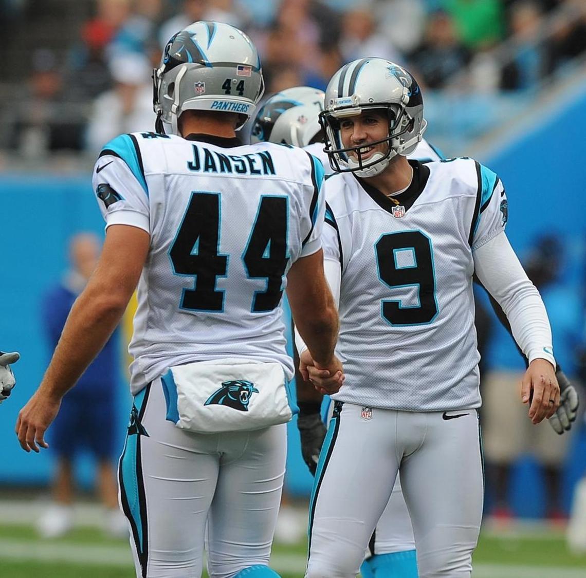 Panthers long snapper J.J. Jansen (left) congratulates kicker Graham Gano after a successful field goal.