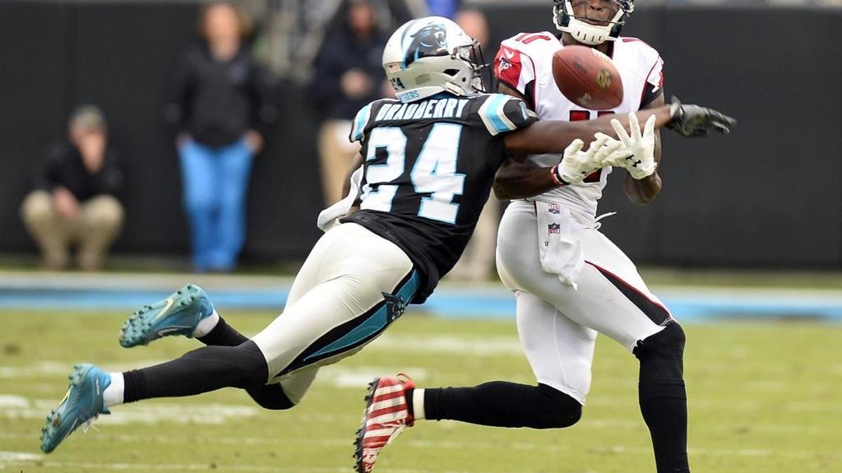 Carolina Panthers cornerback James Bradberry (24) breaks up a pass intended for Atlanta Falcons wide receiver Julio Jones (11) on Dec. 24, 2016. Jones gained 60 receiving yards during the game after catching passes for 300 yards the first time the two teams played.
