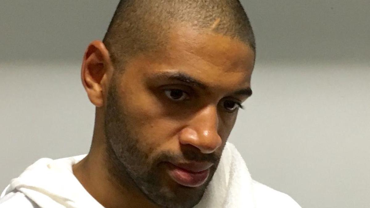A disappointed Nic Batum answers questions in a hallway in Rio following France’s 87-66 loss to Australia in Olympic round-robin play Saturday.
